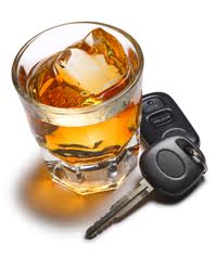Glass of alcohol and car keys